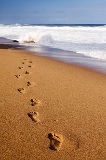Energy Healing. Library Image: Footsteps in Sand